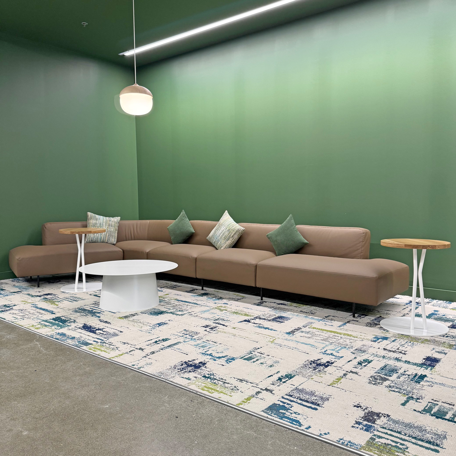 Reconfigured office lounge corner with modular sectional seating